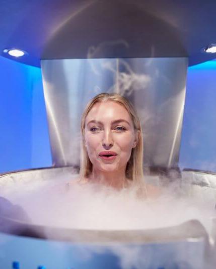 Woman chilling in cryochamber